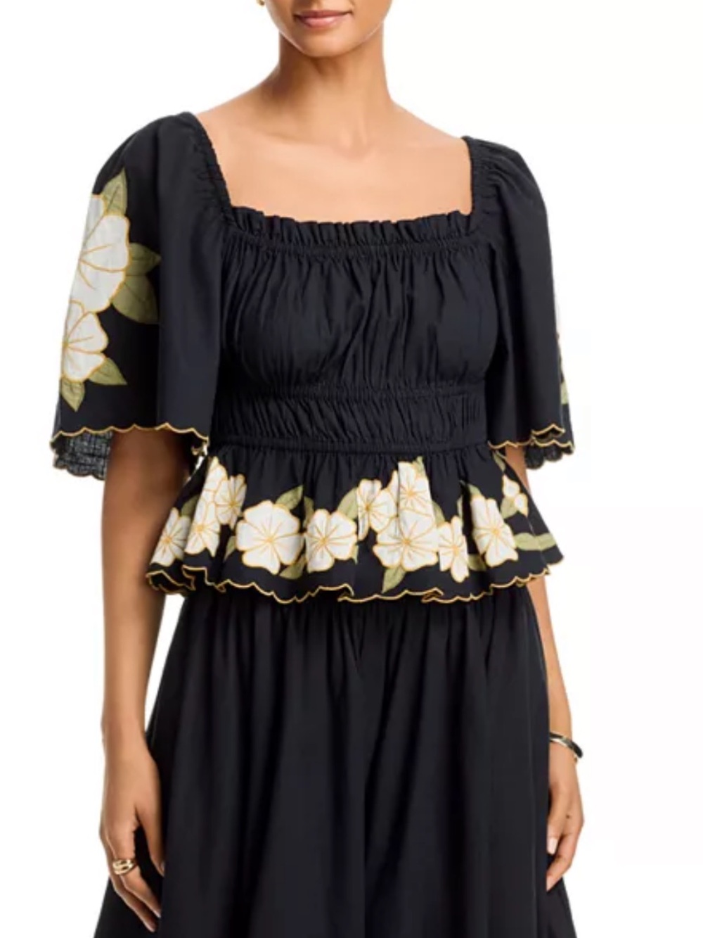 THE GREAT. Black Peplum Top with Cream Floral Embroidery